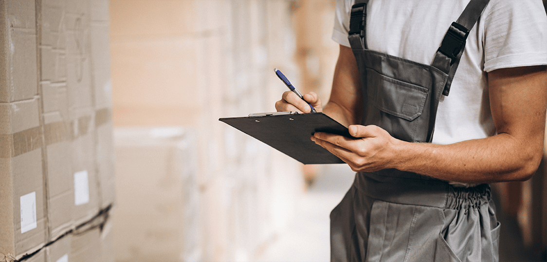 Technician taking notes for test plan