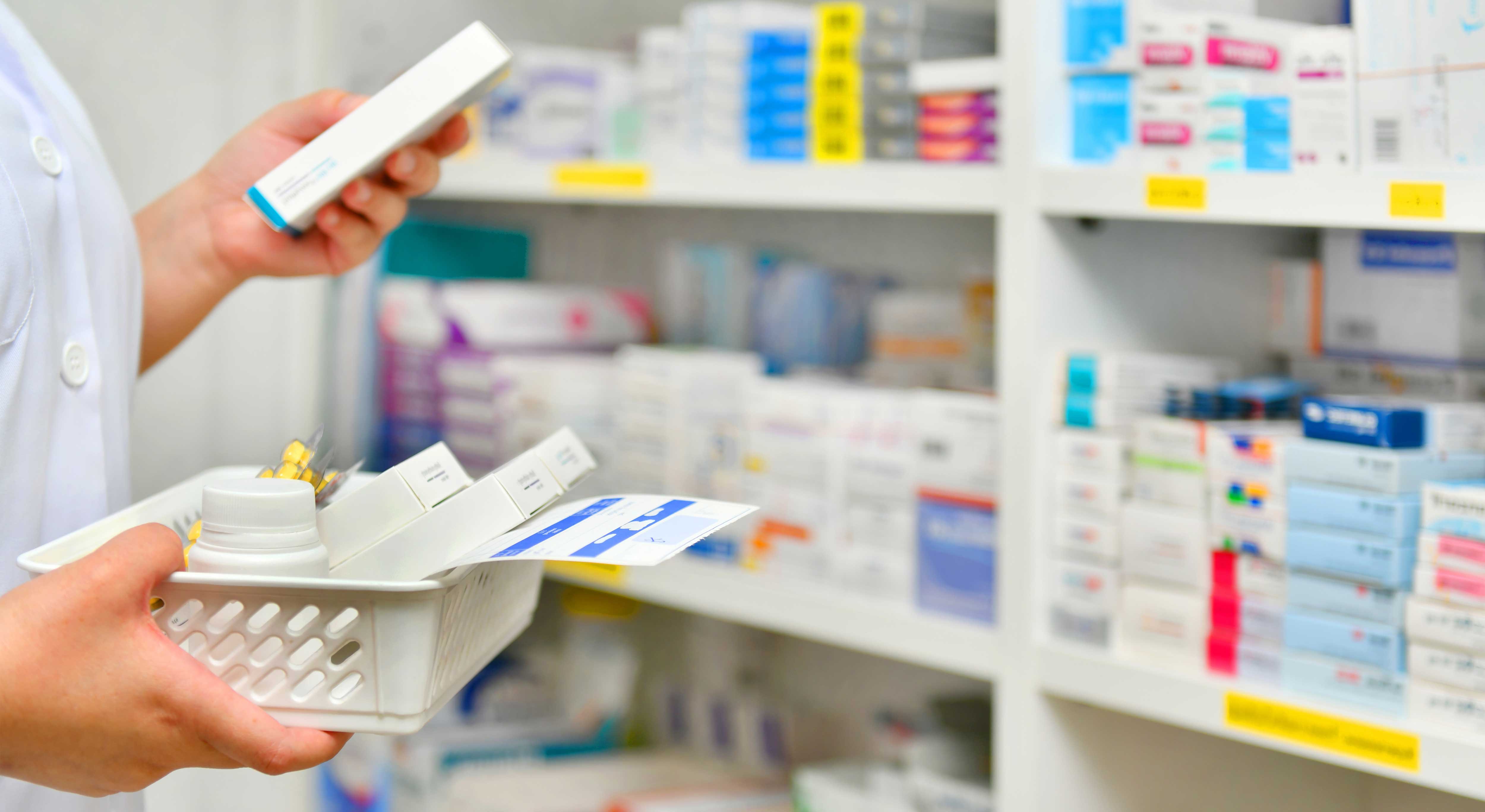 pharmacist-filling-prescription-pharmacy-drugstore