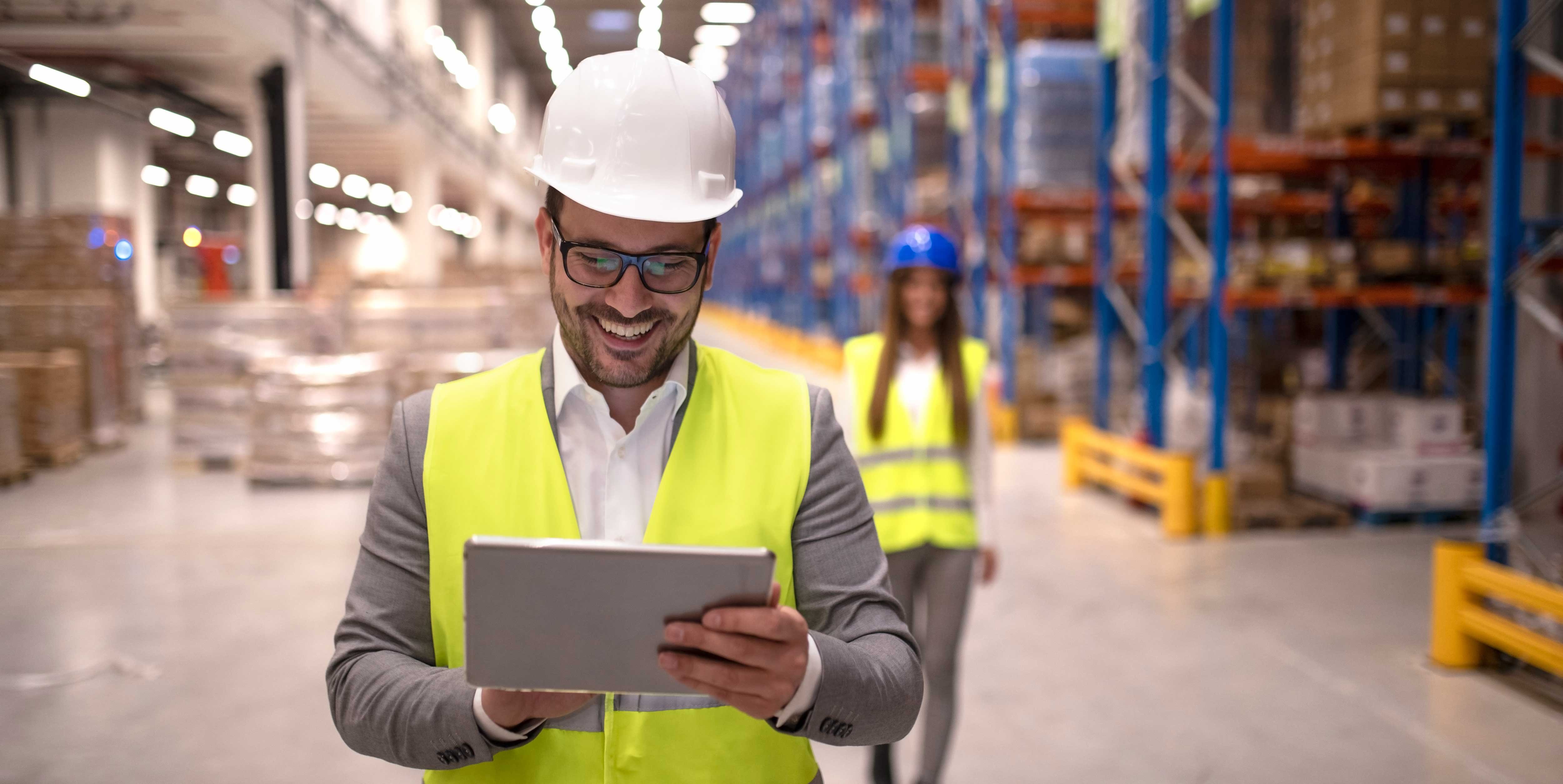 warehouse-manager-reading-report-tablet-about-successful-delivery-distribution-warehouse-logistics-center